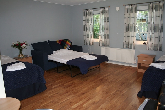Imagen de la habitación del Hotel H&ouml;llviksn&auml;s m&ouml;ten mat logi. Foto 8