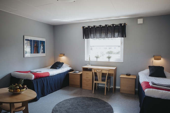 Imagen de la habitación del Hotel H&ouml;llviksn&auml;s m&ouml;ten mat logi. Foto 9