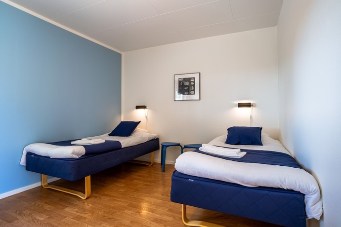 Imagen de la habitación del Hotel H&ouml;llviksn&auml;s m&ouml;ten mat logi. Foto 12