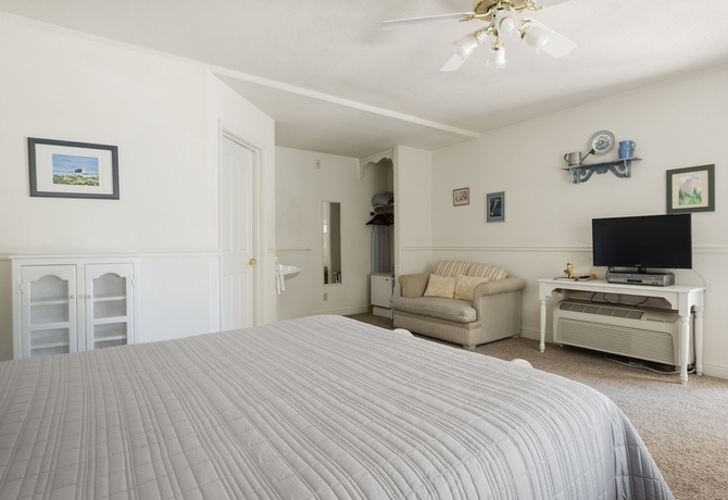 Imagen de la habitación del Hotel Hounds Tooth Inn. Foto 16