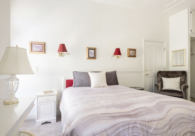 Imagen de la habitación del Hotel Hounds Tooth Inn. Foto 17