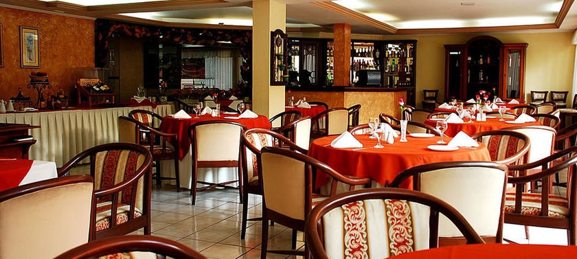 Imagen del bar/restaurante del Hotel House Inn Apart. Foto 3