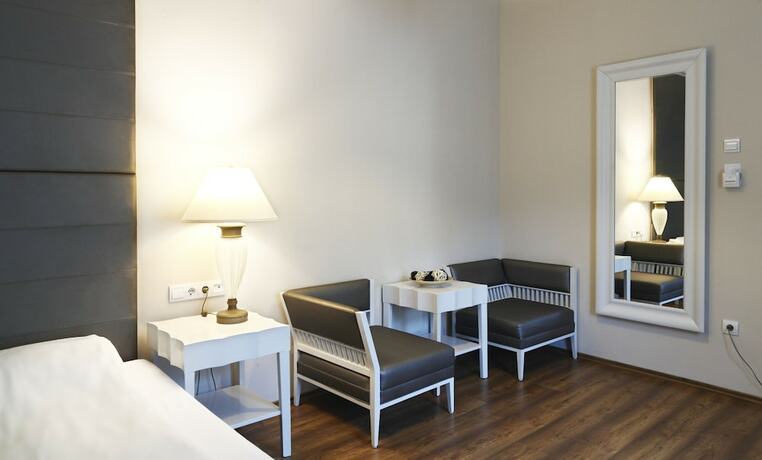 Imagen de la habitación del Hotel House Octogon. Foto 16