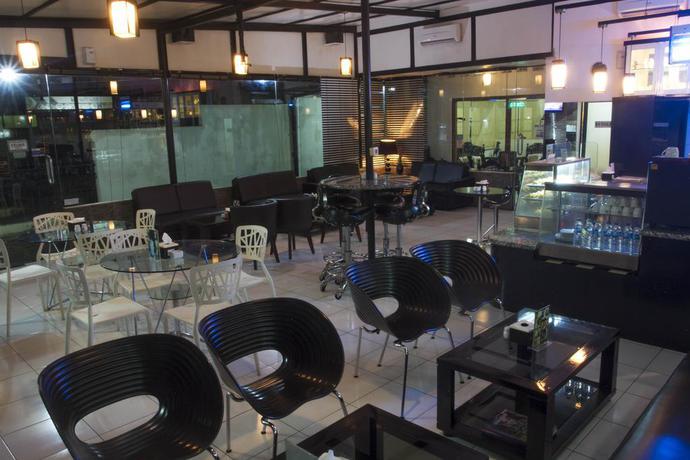 Imagen del bar/restaurante del Hotel House Of Arsonia Bougainvillea. Foto 2