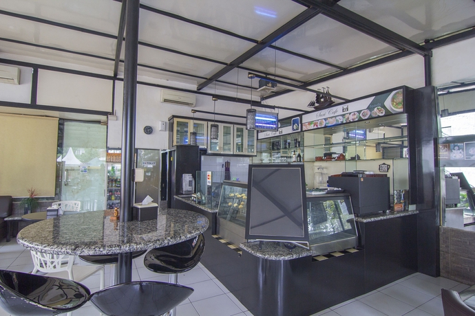 Imagen del bar/restaurante del Hotel House Of Arsonia Bougainvillea. Foto 3