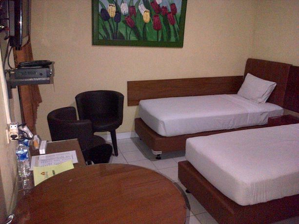 Imagen de la habitación del Hotel House Of Arsonia Flamboyant. Foto 4