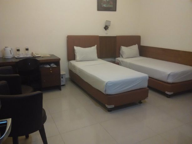 Imagen de la habitación del Hotel House Of Arsonia Flamboyant. Foto 7