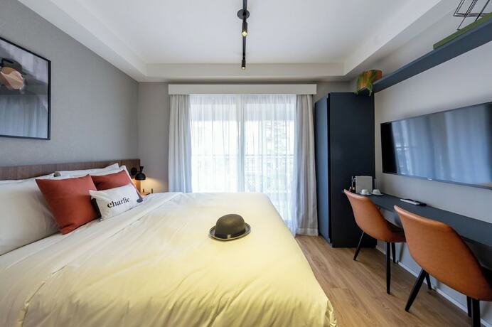 Imagen de la habitación del Hotel House of Charlie Paraiso. Foto 17