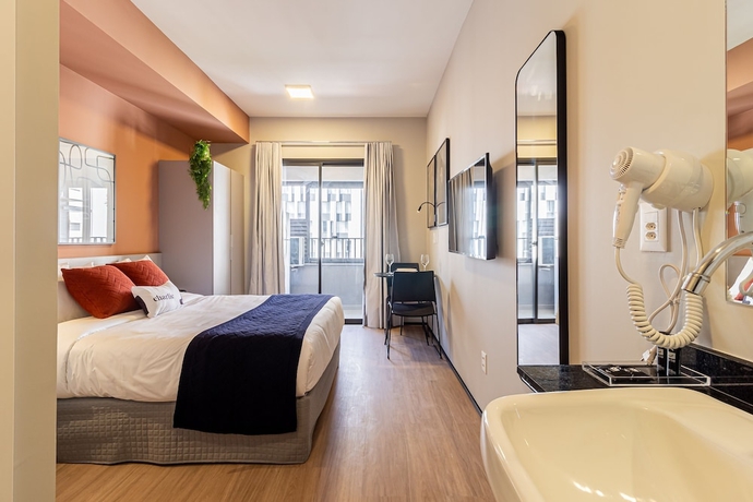 Imagen de la habitación del Hotel House of Charlie Pinheiros. Foto 8
