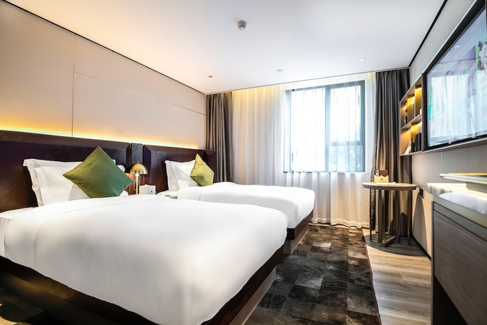 Imagen de la habitación del Hotel Housekeeper Beijing Road Branch. Foto 5