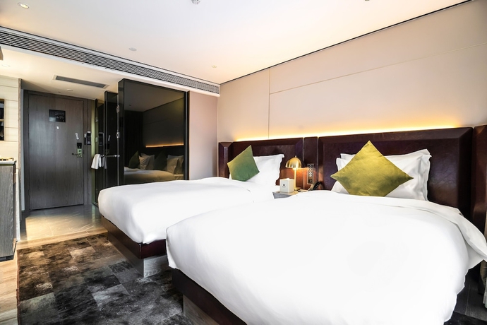 Imagen de la habitación del Hotel Housekeeper Beijing Road Branch. Foto 6