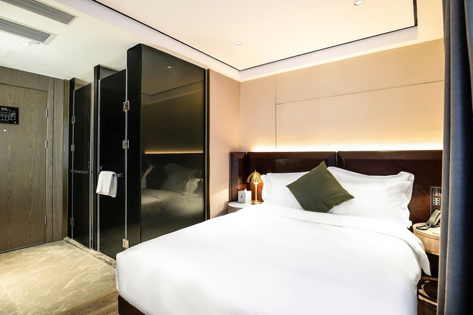 Imagen de la habitación del Hotel Housekeeper Beijing Road Branch. Foto 8