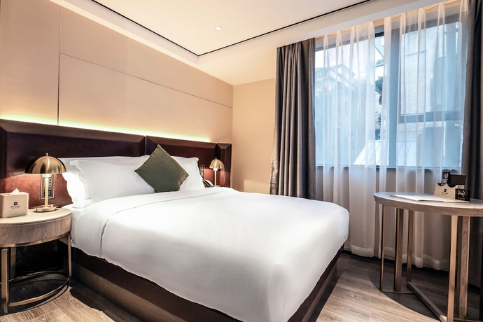 Imagen de la habitación del Hotel Housekeeper Beijing Road Branch. Foto 10