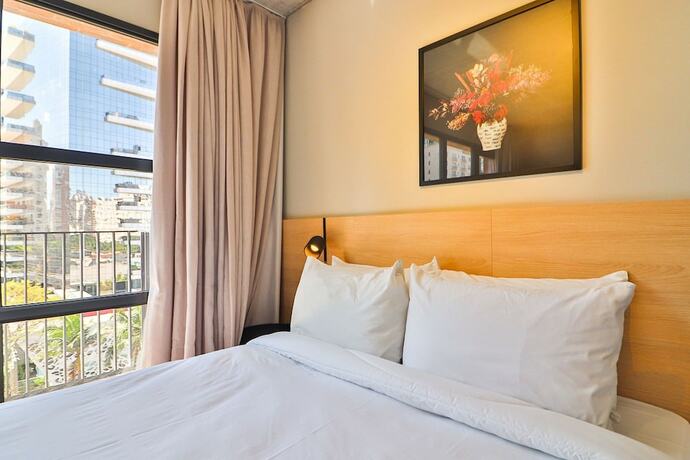 Imagen de la habitación del Hotel Housi Faria Lima. Foto 17