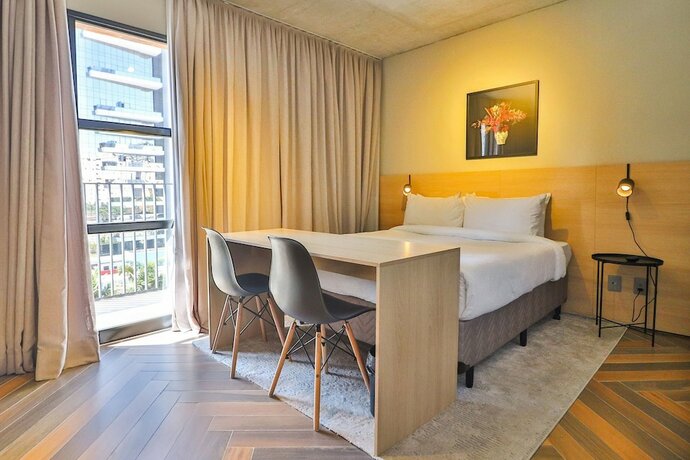 Imagen de la habitación del Hotel Housi Faria Lima. Foto 18