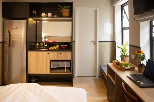 Imagen de la habitación del Hotel Housi Paulista. Foto 17