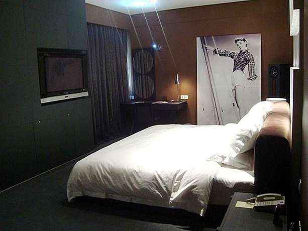 Imagen de la habitación del Hotel Housing Urban Zibo. Foto 4