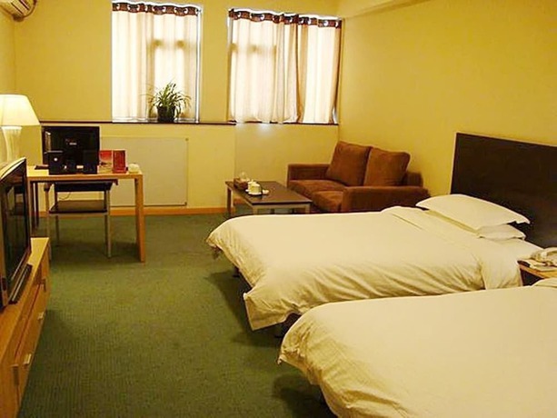 Imagen de la habitación del Hotel Housing Urban Zibo. Foto 7