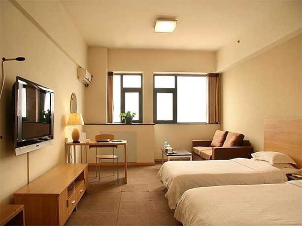 Imagen de la habitación del Hotel Housing Urban Zibo. Foto 8