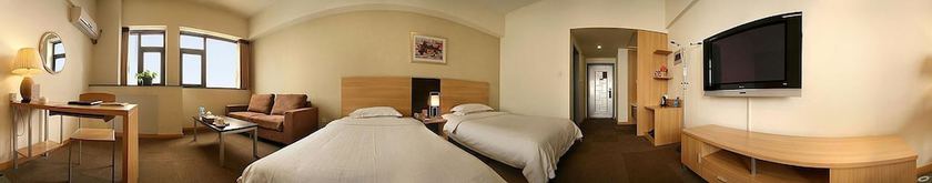 Imagen de la habitación del Hotel Housing Urban Zibo. Foto 10