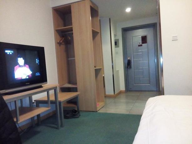 Imagen de la habitación del Hotel Housing Urban Zibo. Foto 11