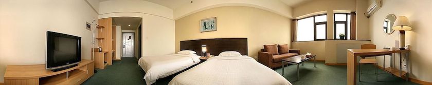 Imagen de la habitación del Hotel Housing Urban Zibo. Foto 15