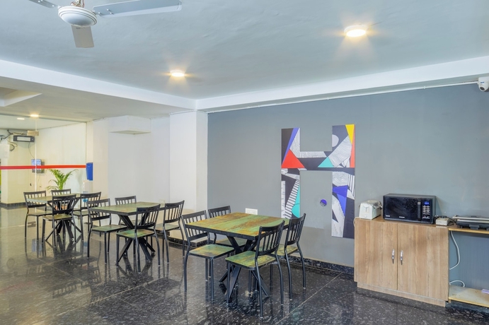 Imagen del bar/restaurante del Hotel Housr 46 M2K Corp Near Park Hospital. Foto 1