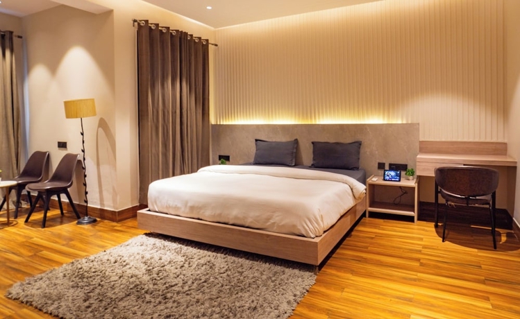 Imagen de la habitación del Hotel Housr Golf Course Road Phase 1 Metro. Foto 4