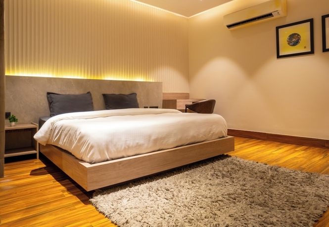 Imagen de la habitación del Hotel Housr Golf Course Road Phase 1 Metro. Foto 5