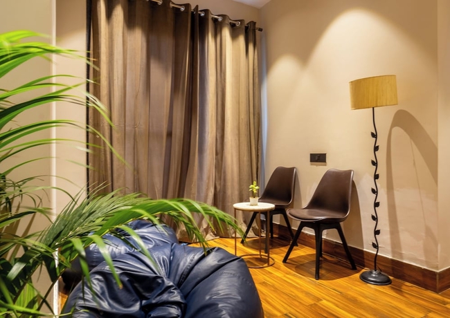 Imagen de la habitación del Hotel Housr Golf Course Road Phase 1 Metro. Foto 6