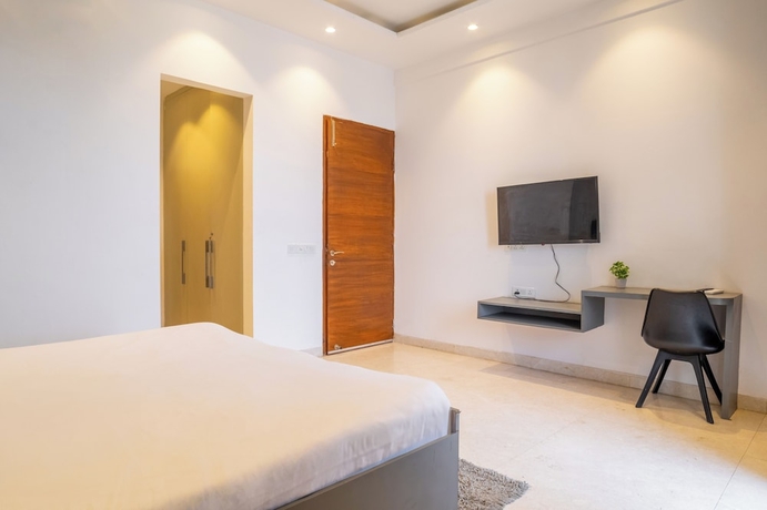 Imagen de la habitación del Hotel Housr Sector 27 Supermart 1 Gurgaon. Foto 2