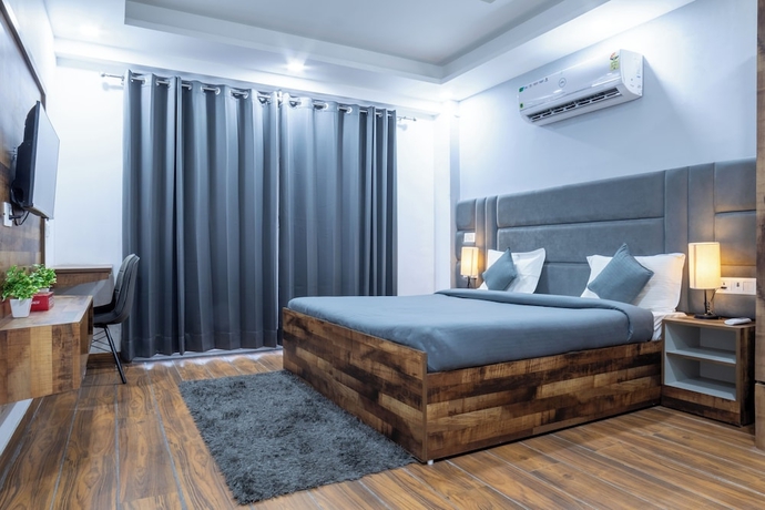 Imagen de la habitación del Hotel Housr Sector 38 Gurgaon Medanta Hospital. Foto 5