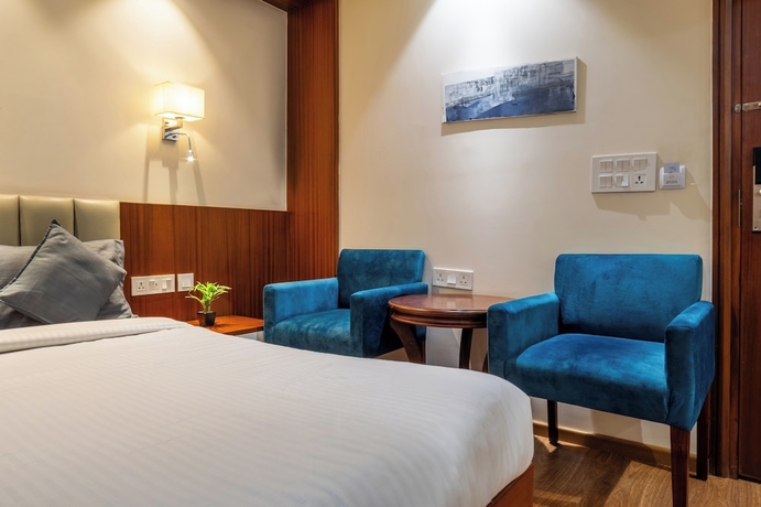 Imagen de la habitación del Hotel Housr Sector 42 Gurgaon Golf Course Road. Foto 4