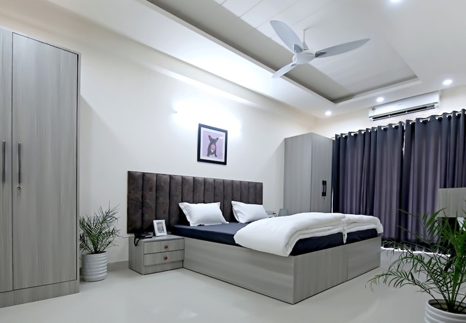 Imagen de la habitación del Hotel Housr Sector 43 Gurgaon Global FoyerMall. Foto 3
