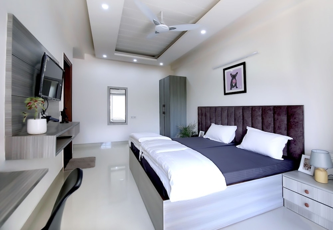 Imagen de la habitación del Hotel Housr Sector 43 Gurgaon Global FoyerMall. Foto 4