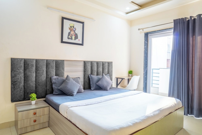 Imagen de la habitación del Hotel Housr Sector 43 Gurgaon Global FoyerMall. Foto 7