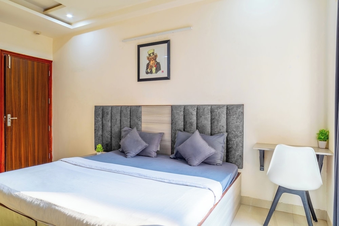 Imagen de la habitación del Hotel Housr Sector 43 Gurgaon Global FoyerMall. Foto 9