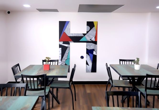Imagen del bar/restaurante del Hotel Housr Sector 43 Gurgaon Global FoyerMall. Foto 1
