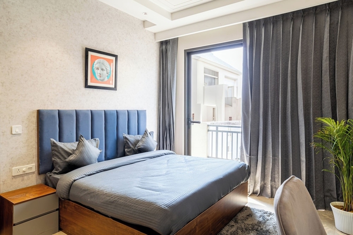 Imagen de la habitación del Hotel Housr Sector 56 Gurgaon Golf Course Road. Foto 1