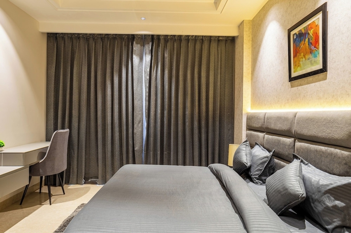 Imagen de la habitación del Hotel Housr Sector 56 Gurgaon Golf Course Road. Foto 7