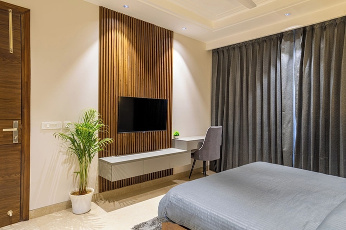 Imagen de la habitación del Hotel Housr Sector 56 Gurgaon Golf Course Road. Foto 12