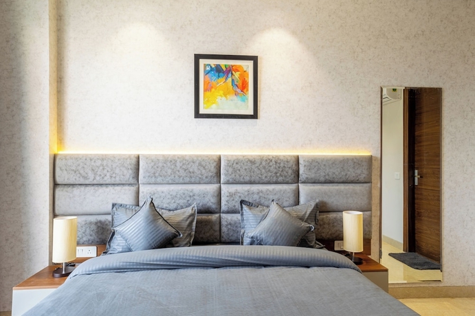 Imagen de la habitación del Hotel Housr Sector 56 Gurgaon Golf Course Road. Foto 14