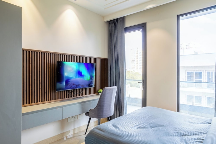 Imagen de la habitación del Hotel Housr Sector 56 Gurgaon Golf Course Road. Foto 15