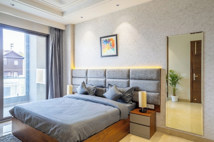 Imagen de la habitación del Hotel Housr Sector 56 Gurgaon Golf Course Road. Foto 16