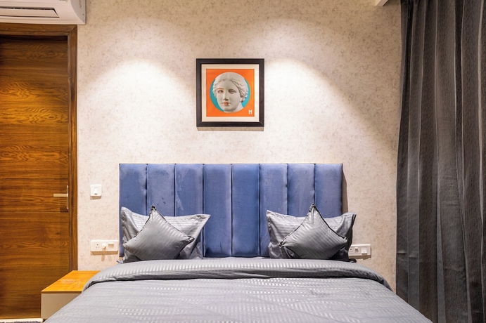 Imagen de la habitación del Hotel Housr Sector 56 Gurgaon Sushant Lok 2. Foto 4