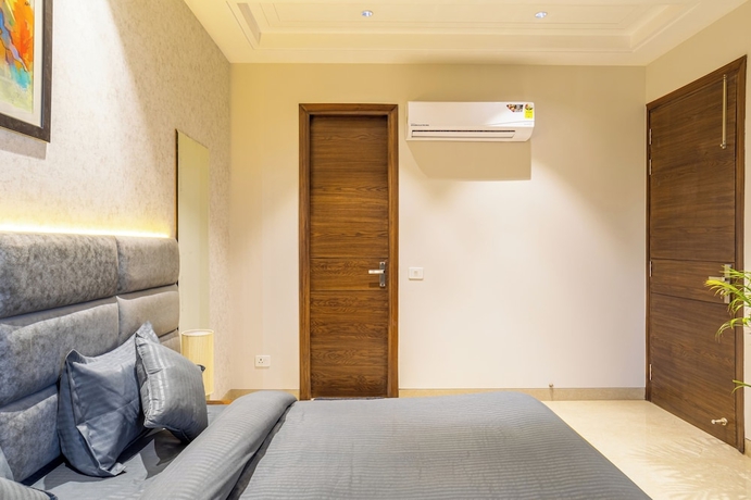 Imagen de la habitación del Hotel Housr Sector 56 Gurgaon Sushant Lok 2. Foto 5