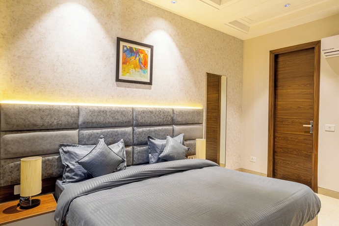 Imagen de la habitación del Hotel Housr Sector 56 Gurgaon Sushant Lok 2. Foto 7