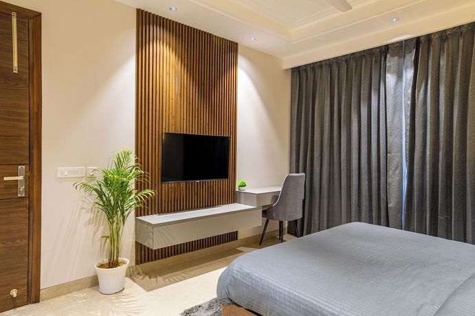 Imagen de la habitación del Hotel Housr Sector 56 Gurgaon Sushant Lok 2. Foto 12