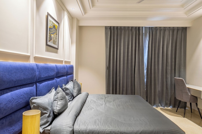 Imagen de la habitación del Hotel Housr Sector 56 Gurgaon Sushant Lok 2. Foto 13