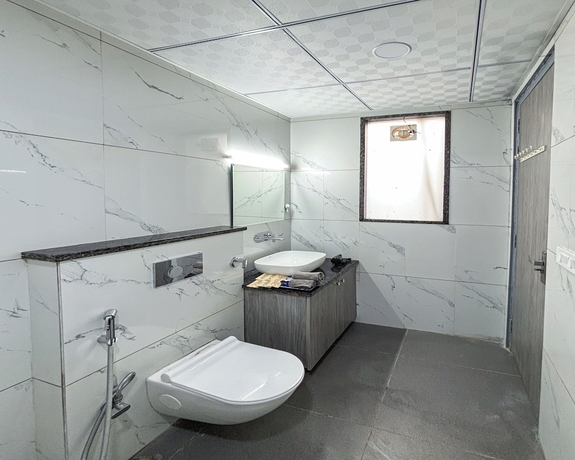 Imagen de la habitación del Hotel Housr Studio Rooms Sector 30 Gurgaon. Foto 11
